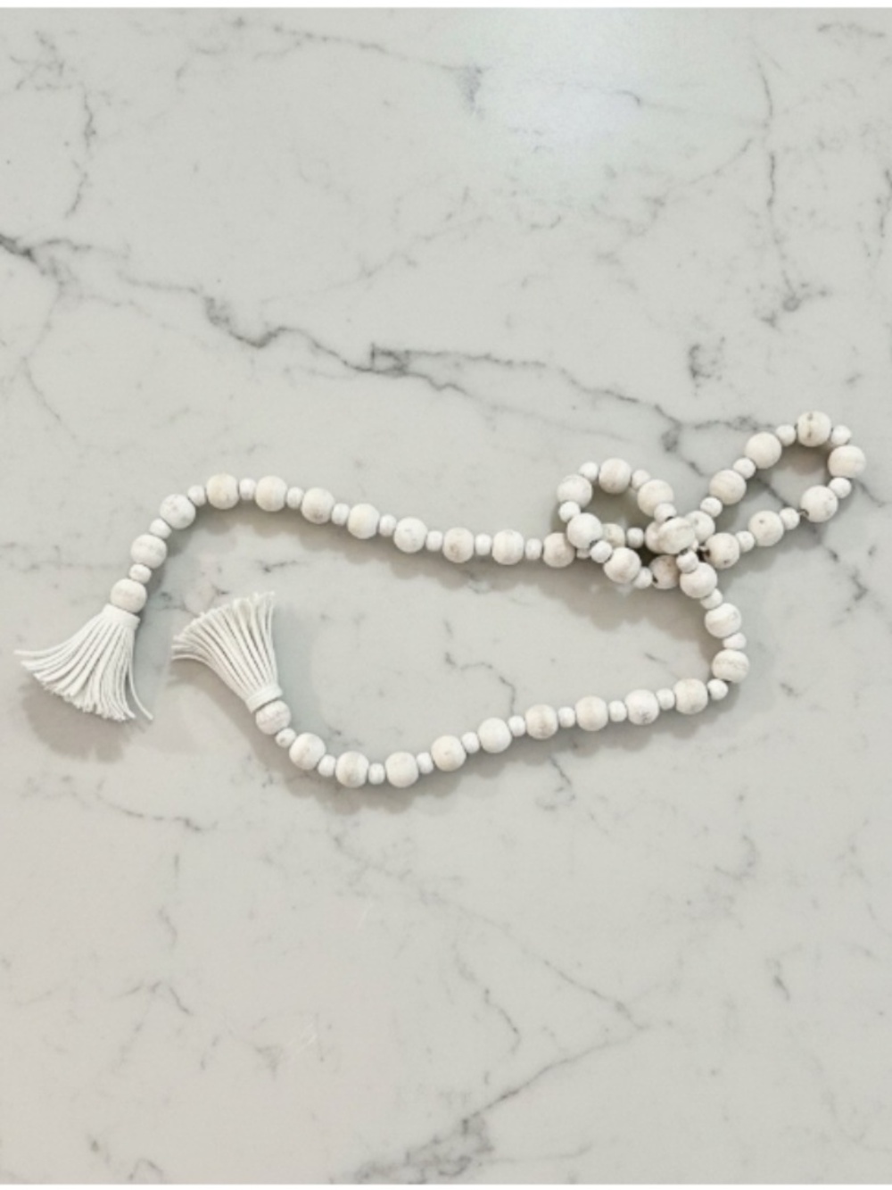 Distressed White Wooden Bead Garland with Leather Tassels